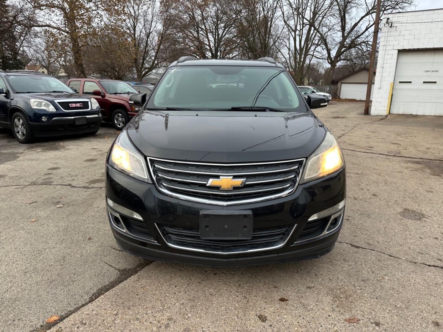 2013 BLACK CHEVROLET TRAVERSE LT (1GNKVGKD1DJ) with an 3.6L engine, Automatic transmission, located at 1708 Broadway, Rockford, IL, 61104, (815) 397-5010, 42.252522, -89.069359- Photo#1