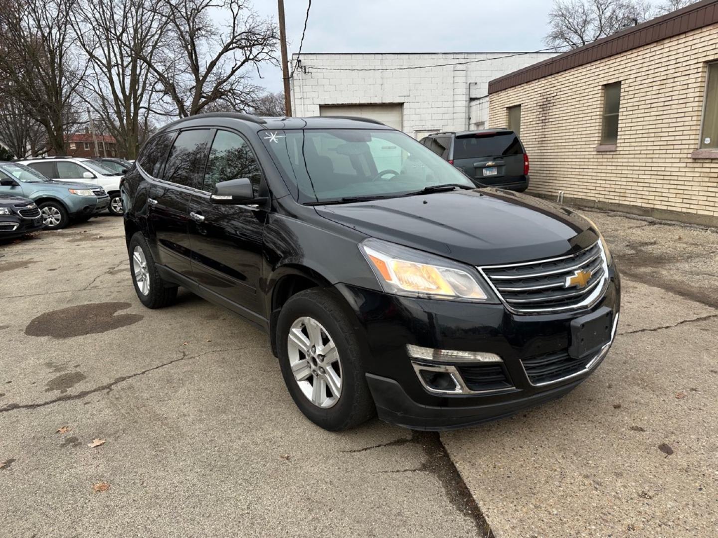 2013 BLACK CHEVROLET TRAVERSE LT (1GNKVGKD1DJ) with an 3.6L engine, Automatic transmission, located at 1708 Broadway, Rockford, IL, 61104, (815) 397-5010, 42.252522, -89.069359- Photo#2