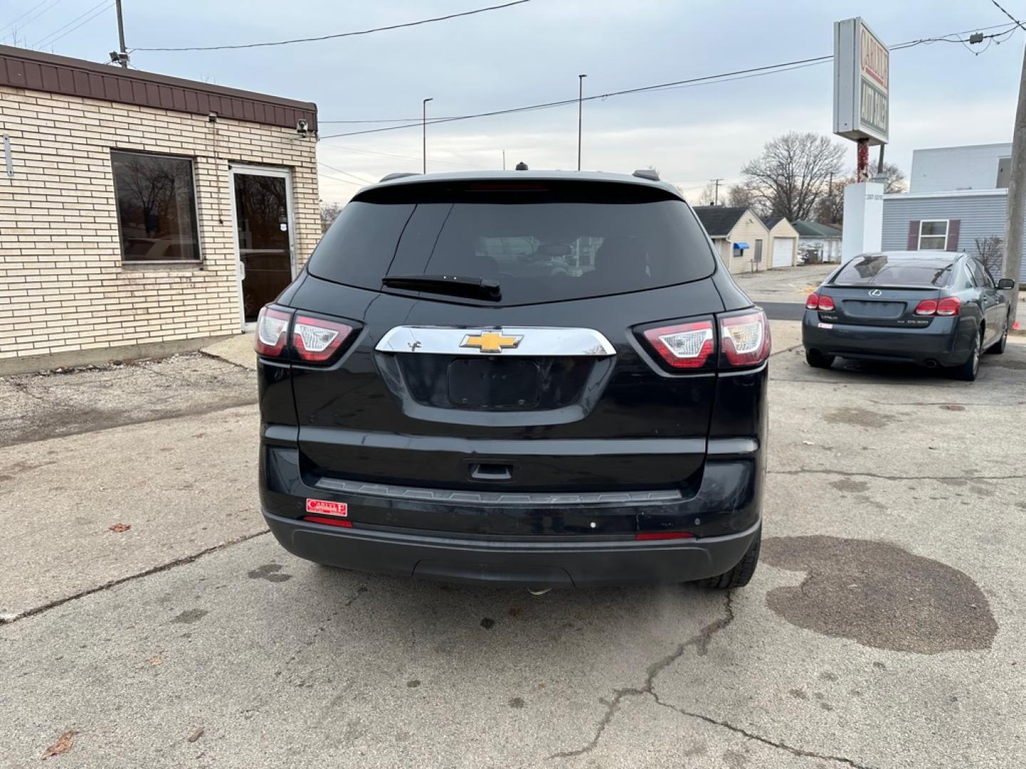 2013 BLACK CHEVROLET TRAVERSE LT (1GNKVGKD1DJ) with an 3.6L engine, Automatic transmission, located at 1708 Broadway, Rockford, IL, 61104, (815) 397-5010, 42.252522, -89.069359- Photo#5