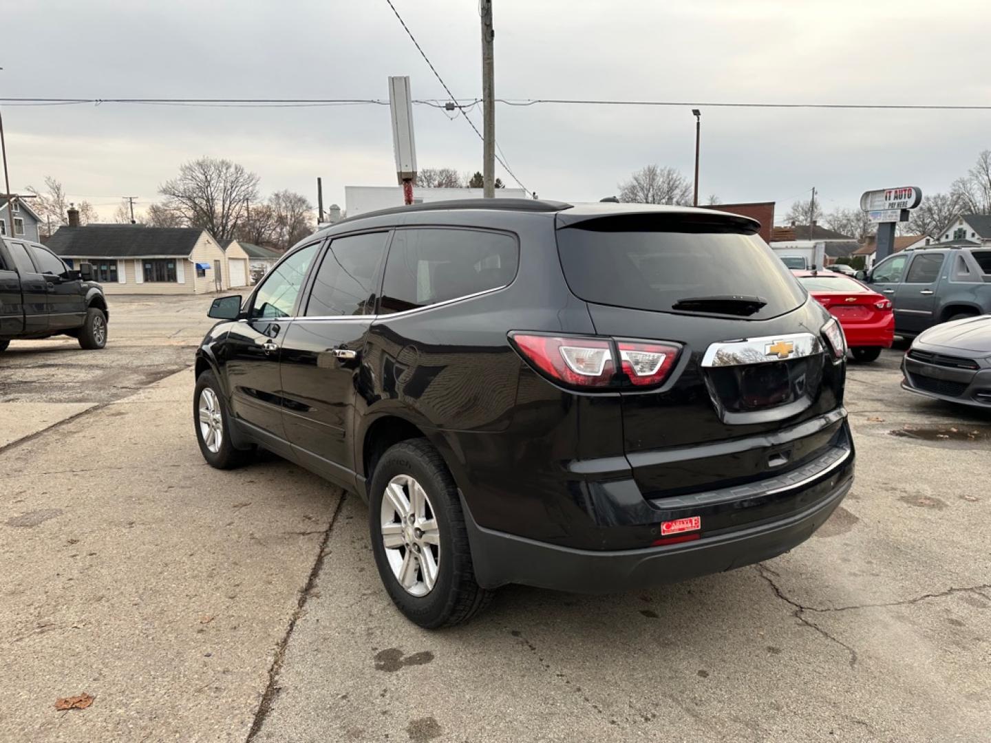2013 BLACK CHEVROLET TRAVERSE LT (1GNKVGKD1DJ) with an 3.6L engine, Automatic transmission, located at 1708 Broadway, Rockford, IL, 61104, (815) 397-5010, 42.252522, -89.069359- Photo#6