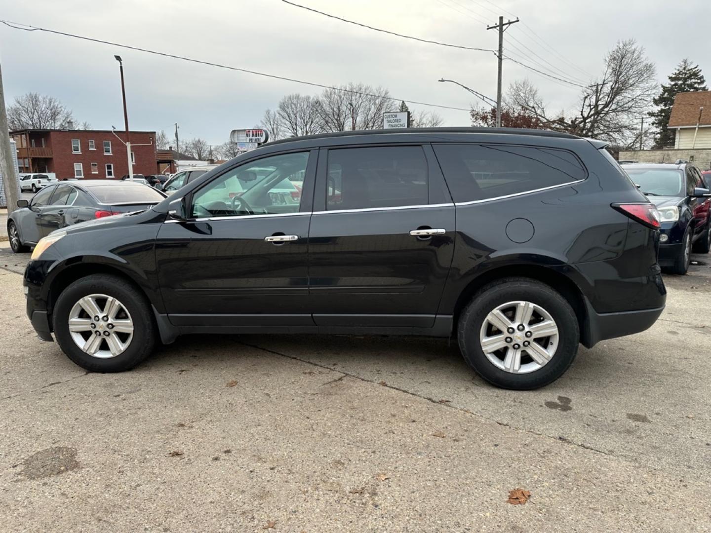 2013 BLACK CHEVROLET TRAVERSE LT (1GNKVGKD1DJ) with an 3.6L engine, Automatic transmission, located at 1708 Broadway, Rockford, IL, 61104, (815) 397-5010, 42.252522, -89.069359- Photo#7