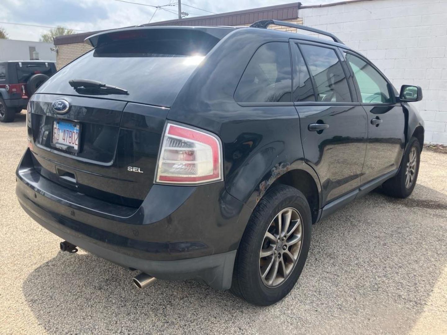 2008 BLACK FORD EDGE SEL (2FMDK38C38B) with an 3.5L engine, Automatic transmission, located at 1708 Broadway, Rockford, IL, 61104, (815) 397-5010, 42.252522, -89.069359 - Photo#2