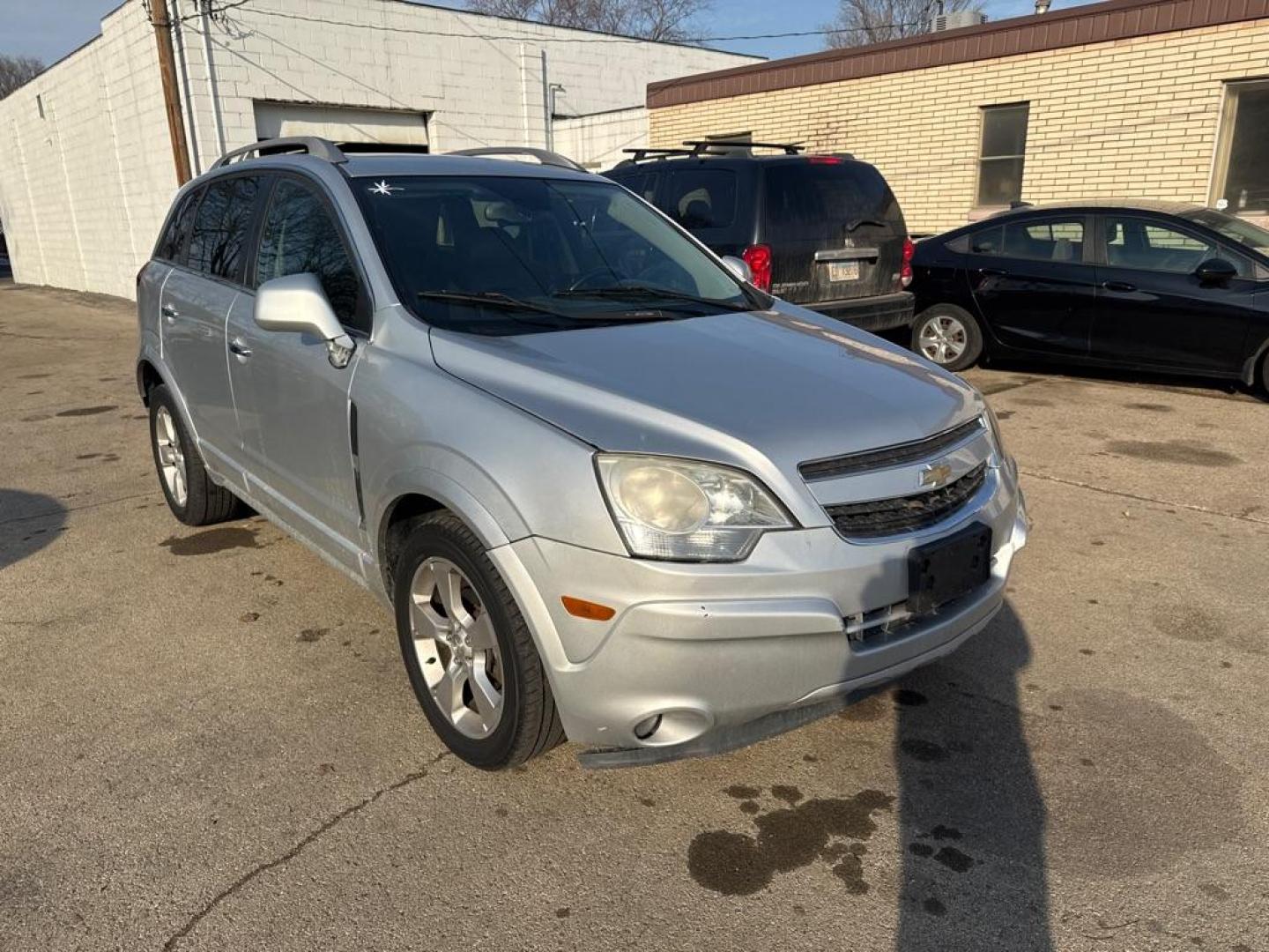 2014 SILVER CHEVROLET CAPTIVA LTZ (3GNAL4EK1ES) with an 2.4L engine, Automatic transmission, located at 1708 Broadway, Rockford, IL, 61104, (815) 397-5010, 42.252522, -89.069359 - Photo#1