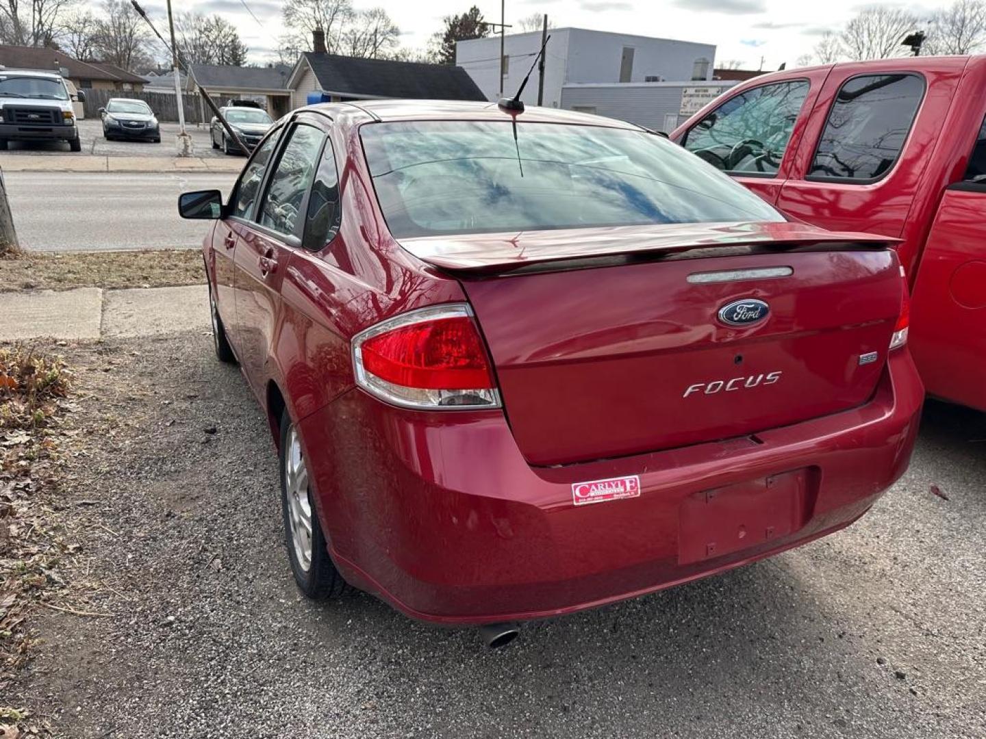 2009 RED FORD FOCUS SES (1FAHP36N59W) with an 2.0L engine, Automatic transmission, located at 1708 Broadway, Rockford, IL, 61104, (815) 397-5010, 42.252522, -89.069359 - Photo#2