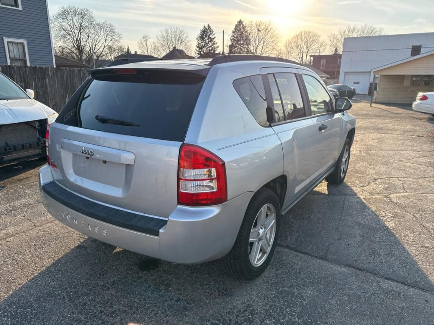 2007 SILVER JEEP COMPASS (1J8FF47W57D) with an 2.4L engine, Continuously Variable transmission, located at 1708 Broadway, Rockford, IL, 61104, (815) 397-5010, 42.252522, -89.069359 - Photo#2