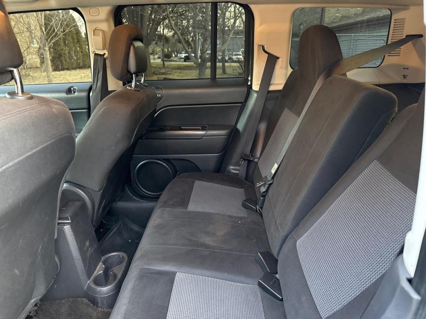 2014 GRAY JEEP PATRIOT LATITUDE (1C4NJPFA9ED) with an 2.0L engine, Continuously Variable transmission, located at 1708 Broadway, Rockford, IL, 61104, (815) 397-5010, 42.252522, -89.069359 - Photo#4