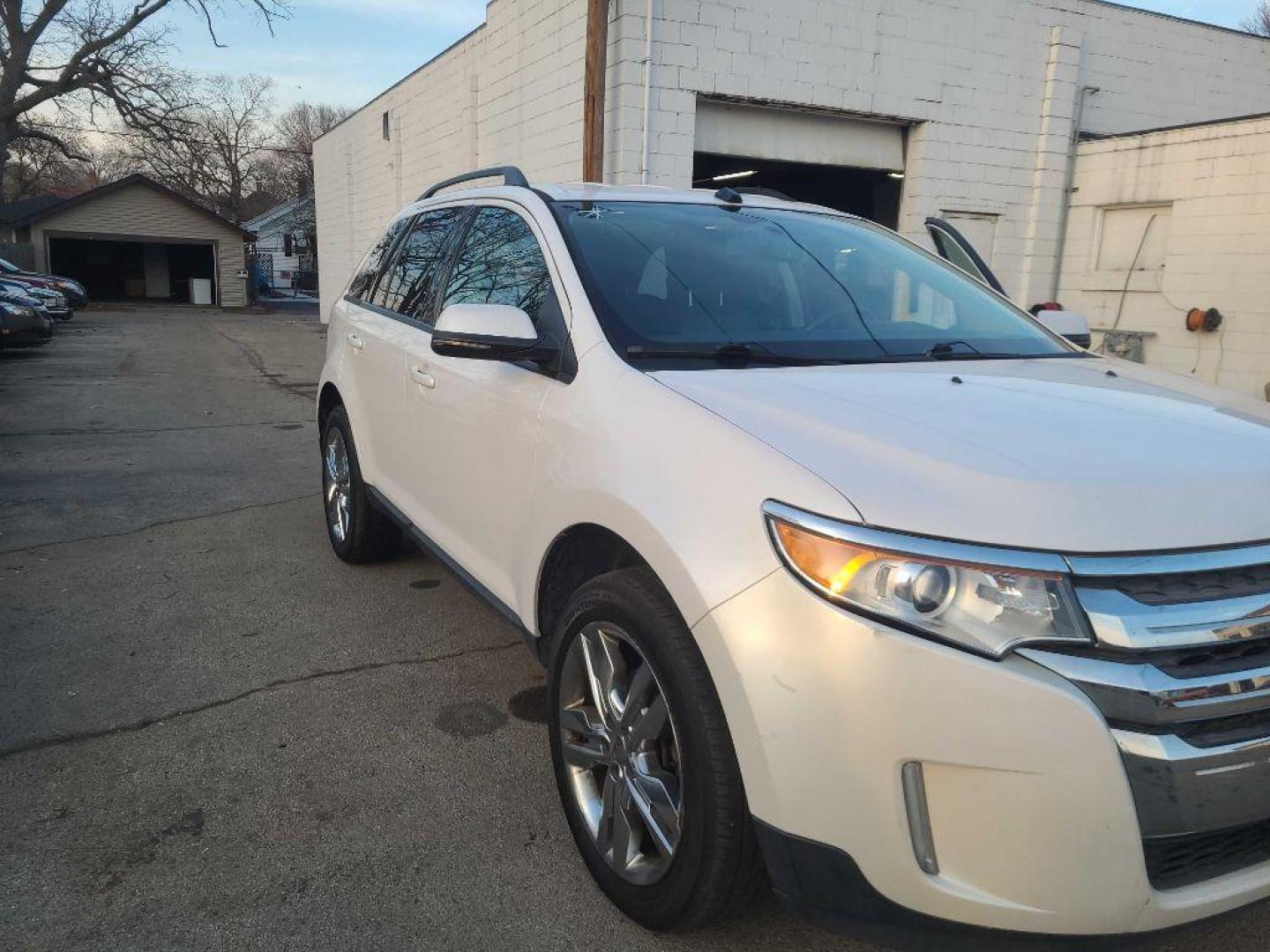 2012 WHITE FORD EDGE SEL (2FMDK4JC0CB) with an 3.5L engine, Automatic transmission, located at 1708 Broadway, Rockford, IL, 61104, (815) 397-5010, 42.252522, -89.069359 - Photo#0