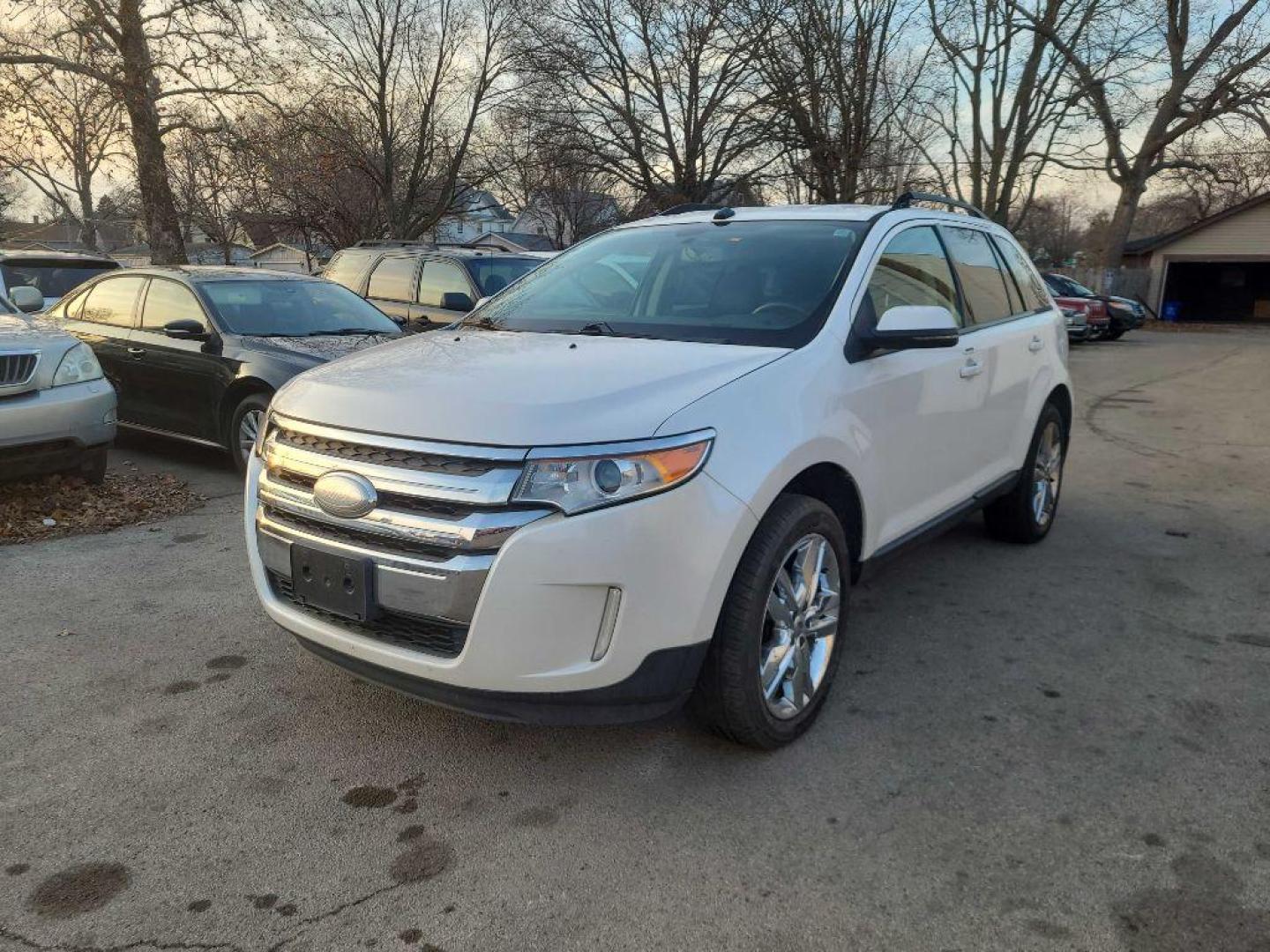 2012 WHITE FORD EDGE SEL (2FMDK4JC0CB) with an 3.5L engine, Automatic transmission, located at 1708 Broadway, Rockford, IL, 61104, (815) 397-5010, 42.252522, -89.069359 - Photo#3