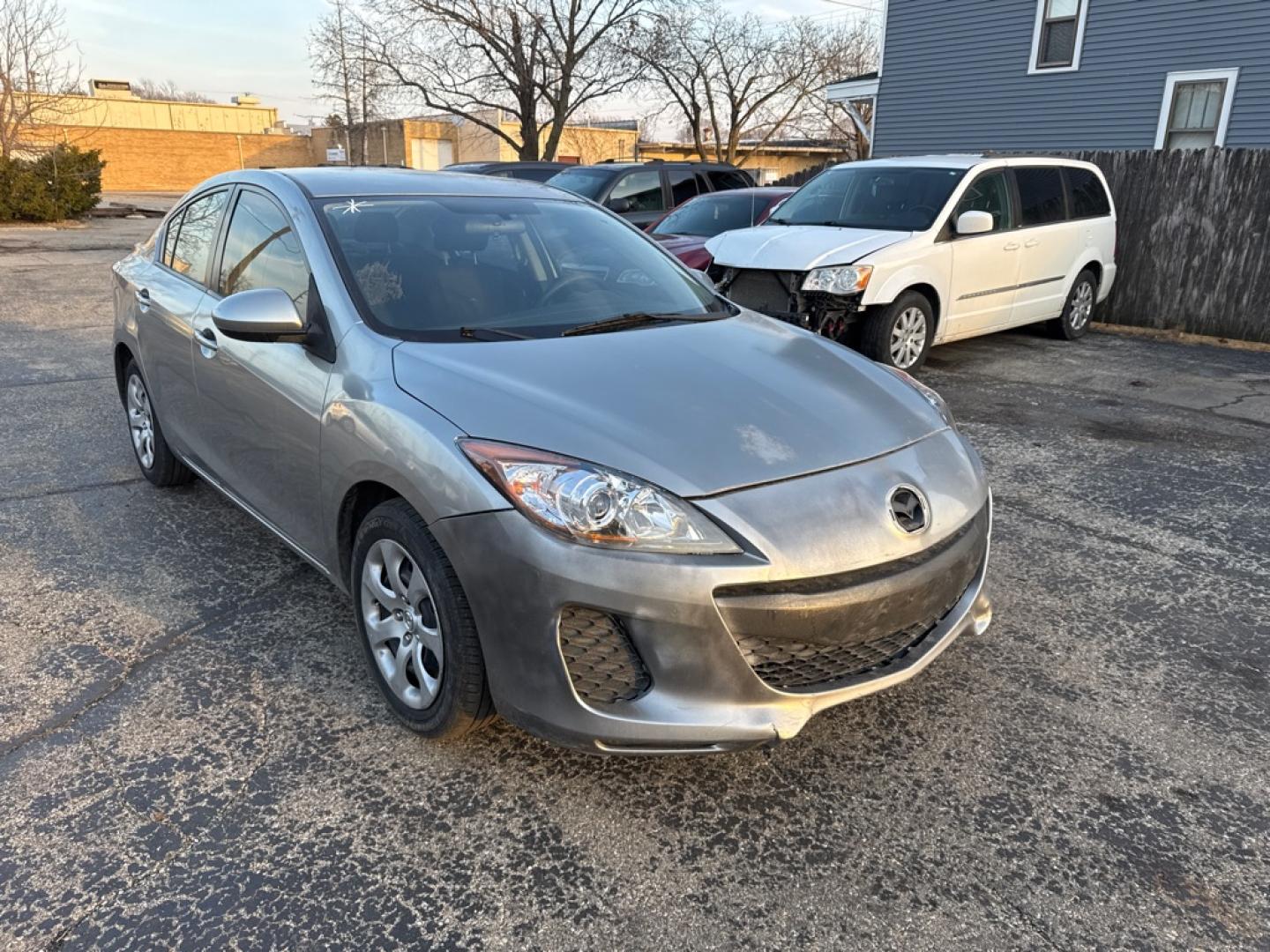 2012 SILVER MAZDA 3 I (JM1BL1UF1C1) with an 2.0L engine, Automatic transmission, located at 1708 Broadway, Rockford, IL, 61104, (815) 397-5010, 42.252522, -89.069359- Photo#1