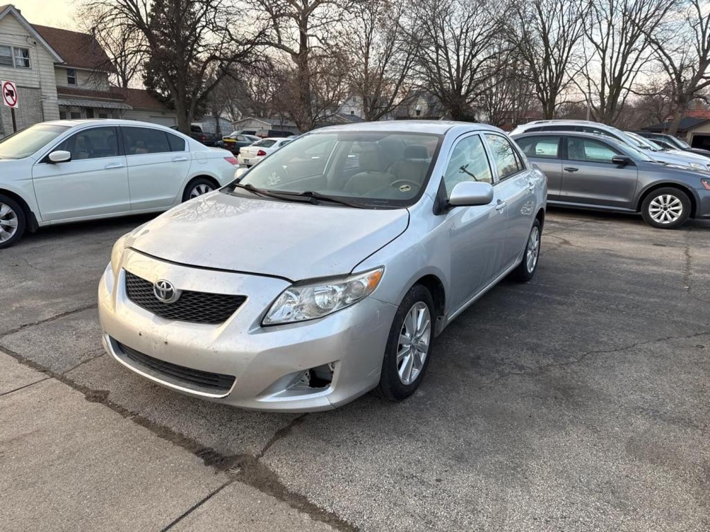 2009 SILVER TOYOTA COROLLA BASE (JTDBL40E799) with an 1.8L engine, Automatic transmission, located at 1708 Broadway, Rockford, IL, 61104, (815) 397-5010, 42.252522, -89.069359 - Photo#12