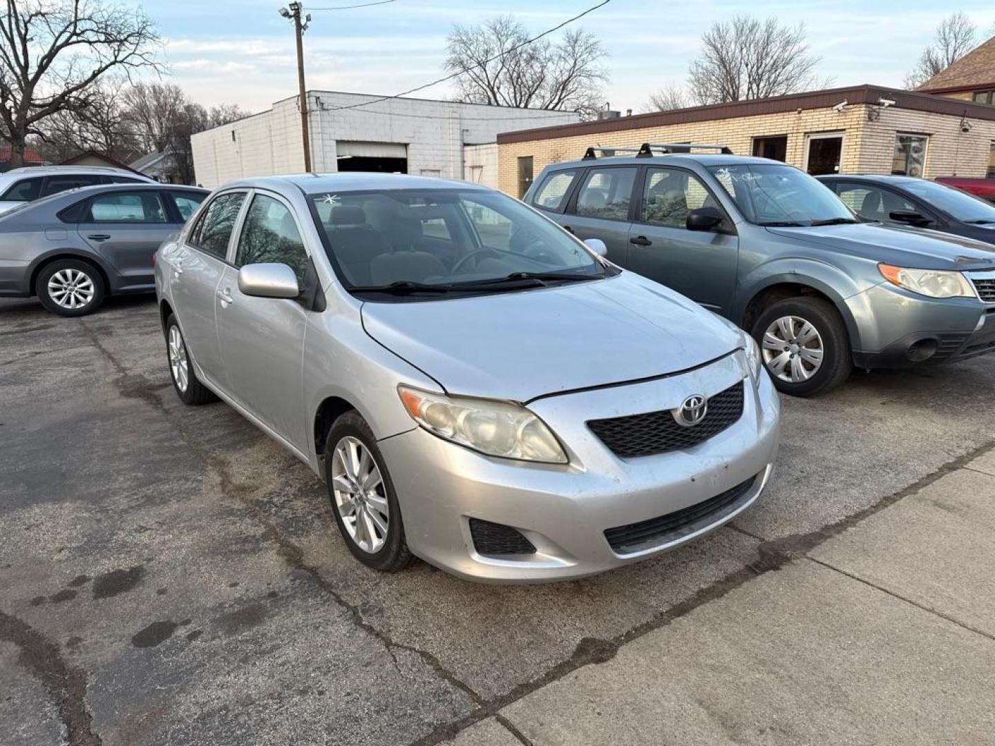 2009 SILVER TOYOTA COROLLA BASE (JTDBL40E799) with an 1.8L engine, Automatic transmission, located at 1708 Broadway, Rockford, IL, 61104, (815) 397-5010, 42.252522, -89.069359 - Photo#13