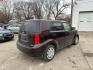 2008 PURPLE SCION XB XB (JTLKE50E681) with an 2.4L engine, Automatic transmission, located at 1708 Broadway, Rockford, IL, 61104, (815) 397-5010, 42.252522, -89.069359 - Photo#2