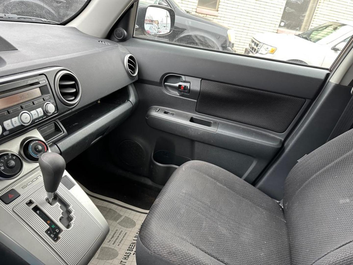 2008 PURPLE SCION XB XB (JTLKE50E681) with an 2.4L engine, Automatic transmission, located at 1708 Broadway, Rockford, IL, 61104, (815) 397-5010, 42.252522, -89.069359 - Photo#7