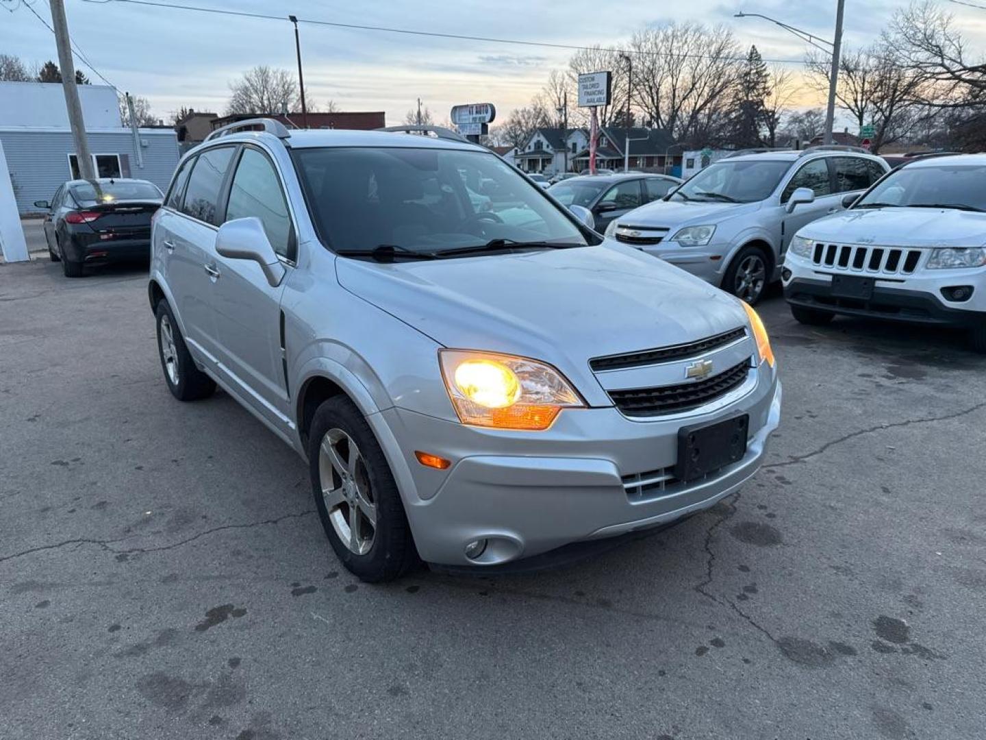2013 SILVER CHEVROLET CAPTIVA LT (3GNAL3EK6DS) with an 2.4L engine, Automatic transmission, located at 1708 Broadway, Rockford, IL, 61104, (815) 397-5010, 42.252522, -89.069359 - Photo#1