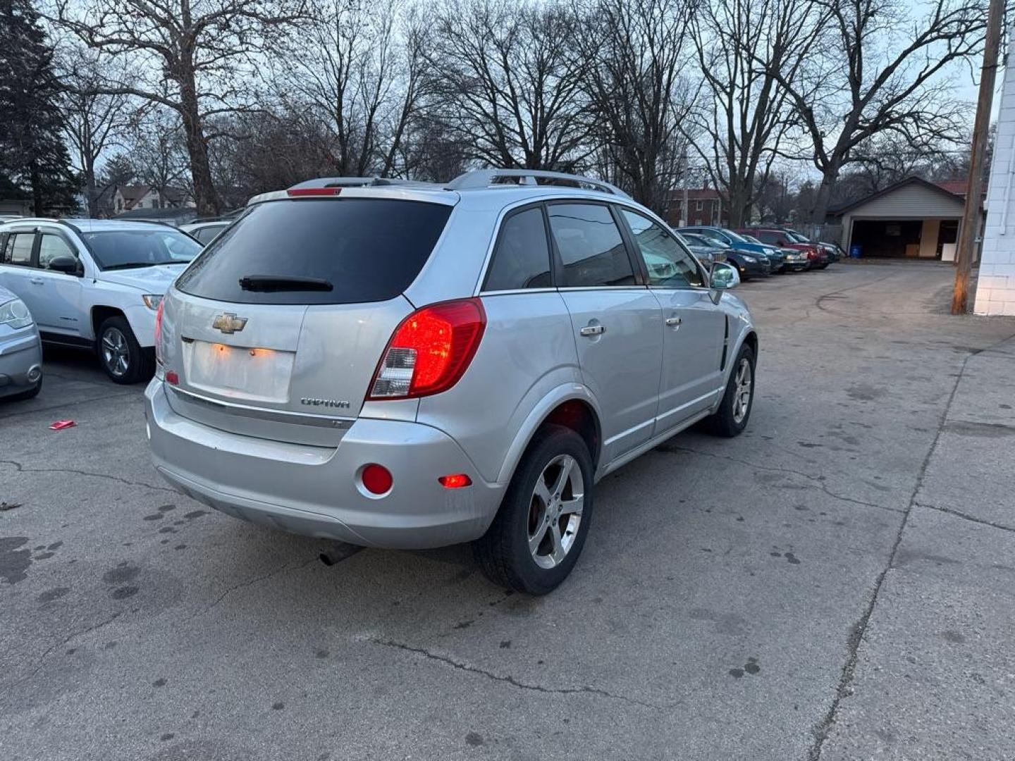2013 SILVER CHEVROLET CAPTIVA LT (3GNAL3EK6DS) with an 2.4L engine, Automatic transmission, located at 1708 Broadway, Rockford, IL, 61104, (815) 397-5010, 42.252522, -89.069359 - Photo#2