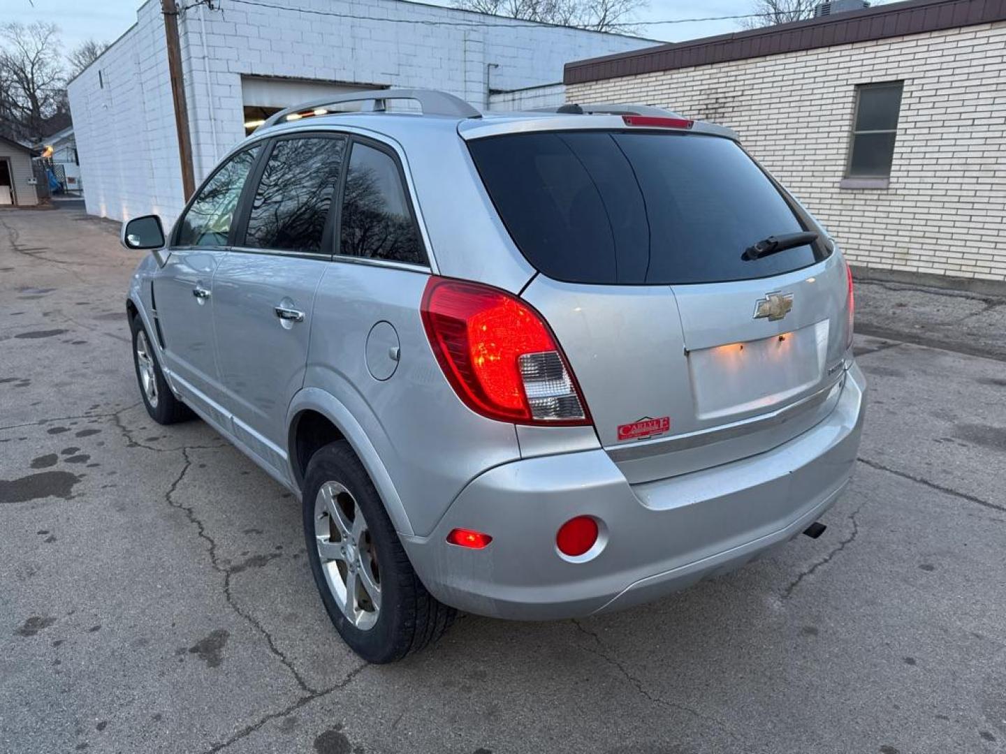 2013 SILVER CHEVROLET CAPTIVA LT (3GNAL3EK6DS) with an 2.4L engine, Automatic transmission, located at 1708 Broadway, Rockford, IL, 61104, (815) 397-5010, 42.252522, -89.069359 - Photo#3