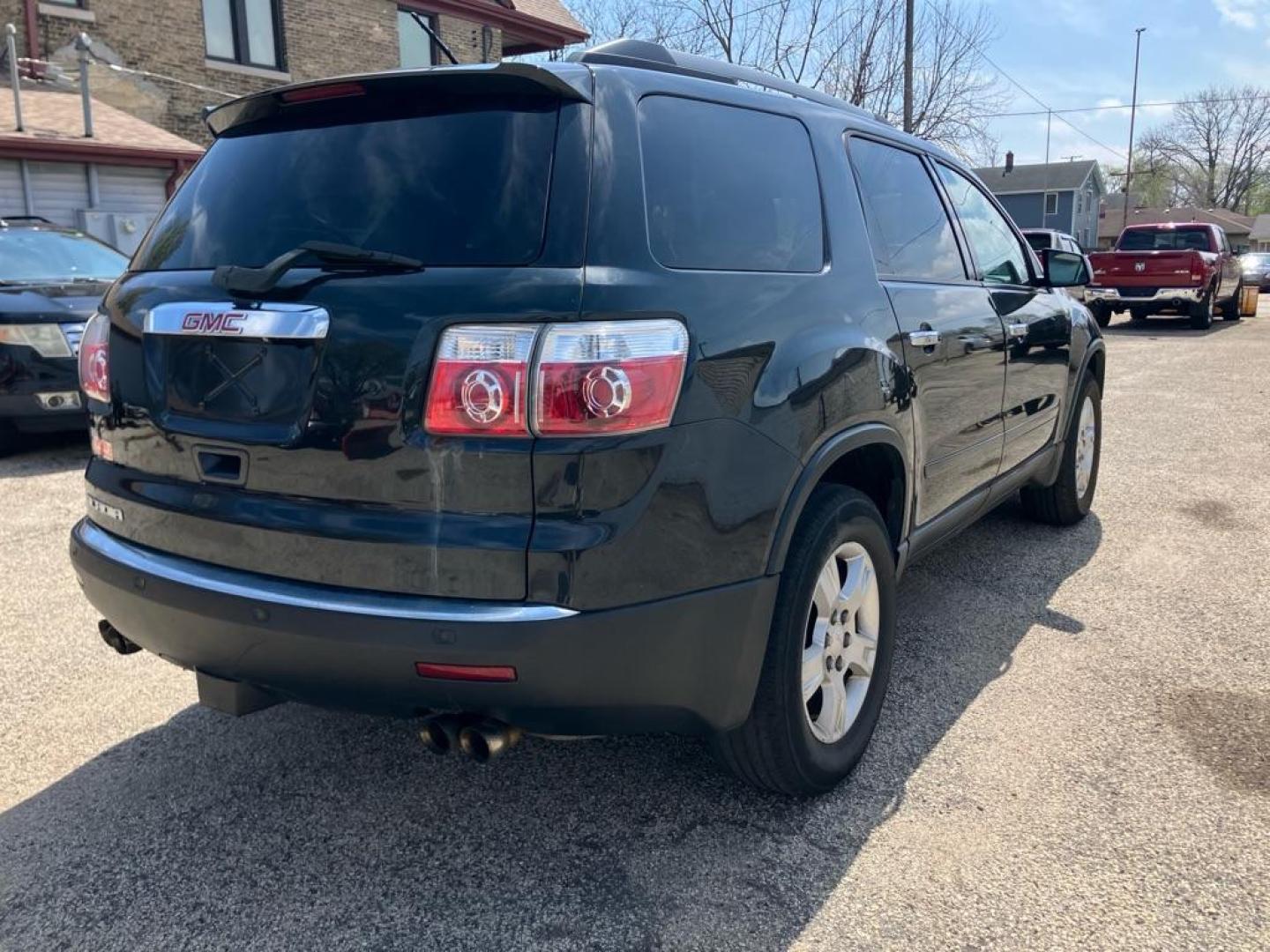 2012 BLACK GMC ACADIA SLE (1GKKRPED6CJ) with an 3.6L engine, Automatic transmission, located at 1708 Broadway, Rockford, IL, 61104, (815) 397-5010, 42.252522, -89.069359 - Photo#2
