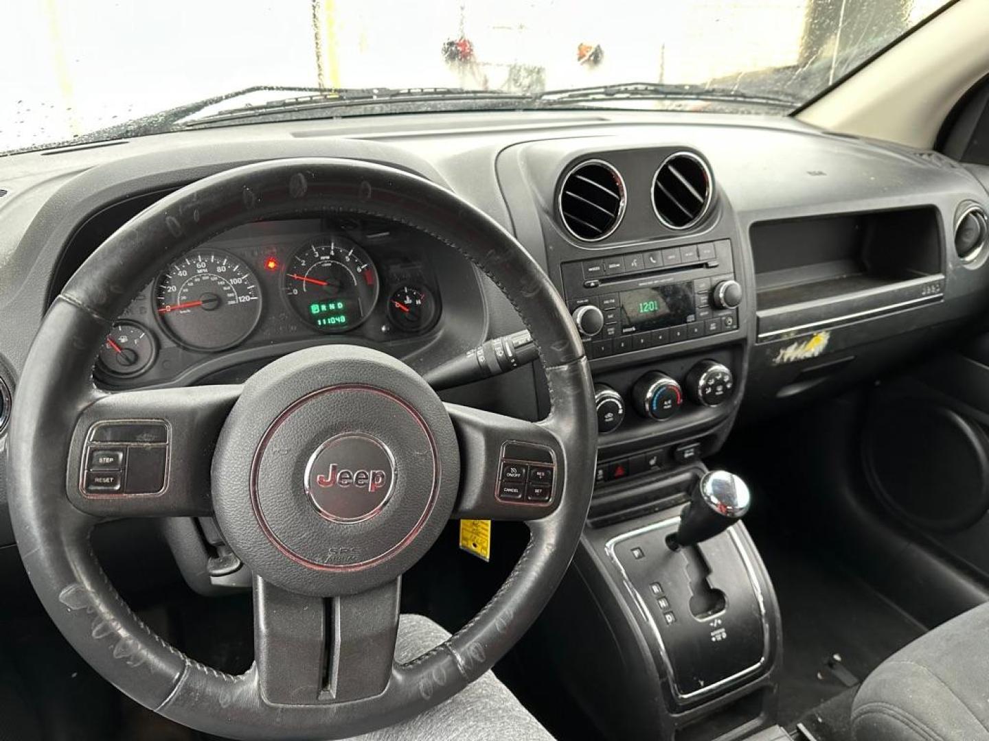 2012 WHITE JEEP COMPASS (1C4NJDAB6CD) with an 2.4L engine, Continuously Variable transmission, located at 1708 Broadway, Rockford, IL, 61104, (815) 397-5010, 42.252522, -89.069359 - Photo#9