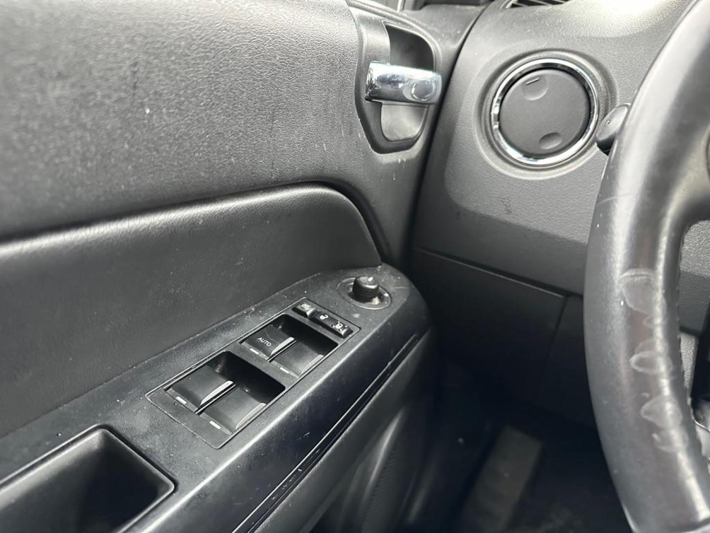 2012 WHITE JEEP COMPASS (1C4NJDAB6CD) with an 2.4L engine, Continuously Variable transmission, located at 1708 Broadway, Rockford, IL, 61104, (815) 397-5010, 42.252522, -89.069359 - Photo#11