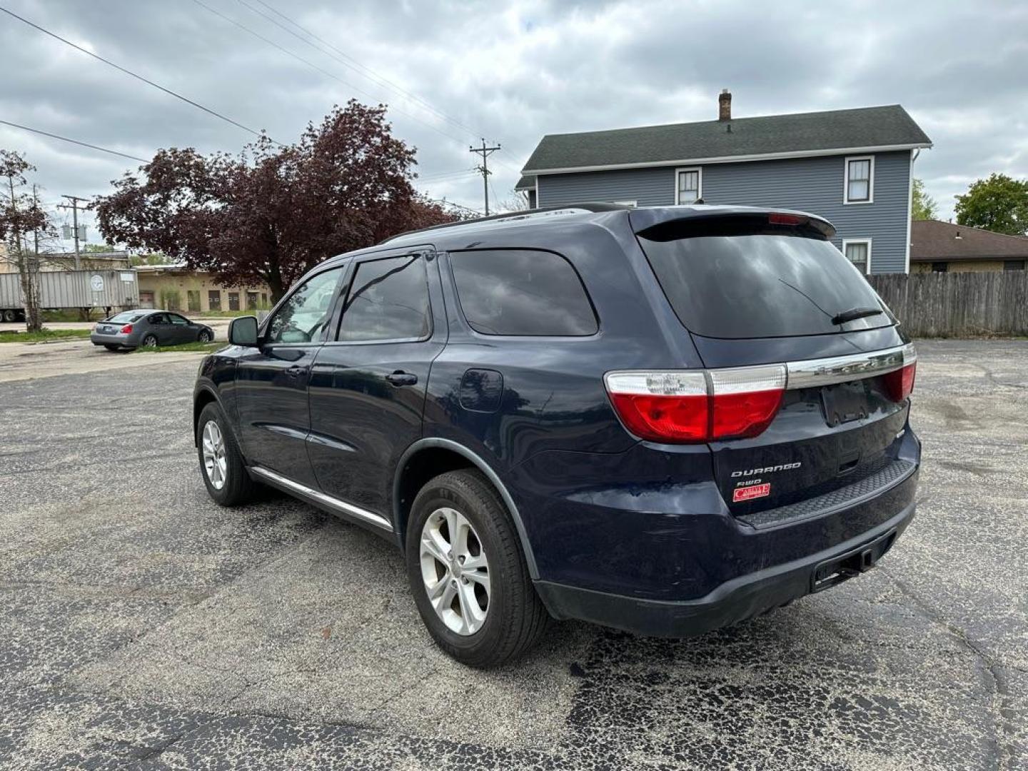 2012 BLUE DODGE DURANGO CREW (1C4RDJDG4CC) with an 3.6L engine, Automatic transmission, located at 1708 Broadway, Rockford, IL, 61104, (815) 397-5010, 42.252522, -89.069359 - Photo#3