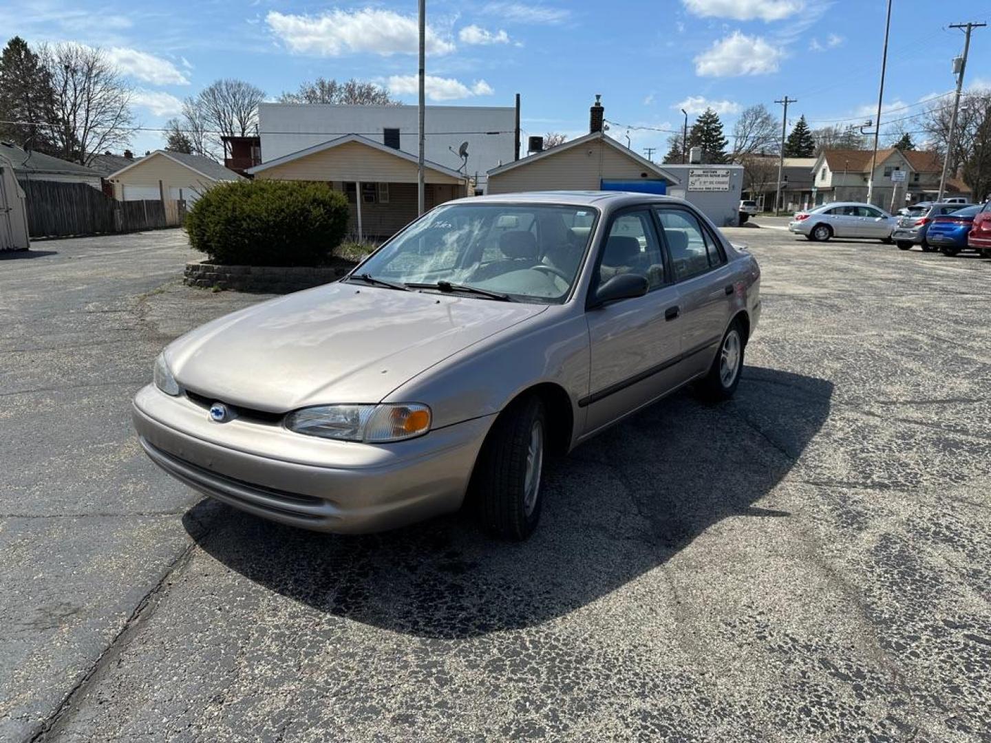 2000 TAN CHEVROLET GEO PRIZM BASE (1Y1SK5488YZ) with an 1.8L engine, Automatic transmission, located at 1708 Broadway, Rockford, IL, 61104, (815) 397-5010, 42.252522, -89.069359 - Photo#0