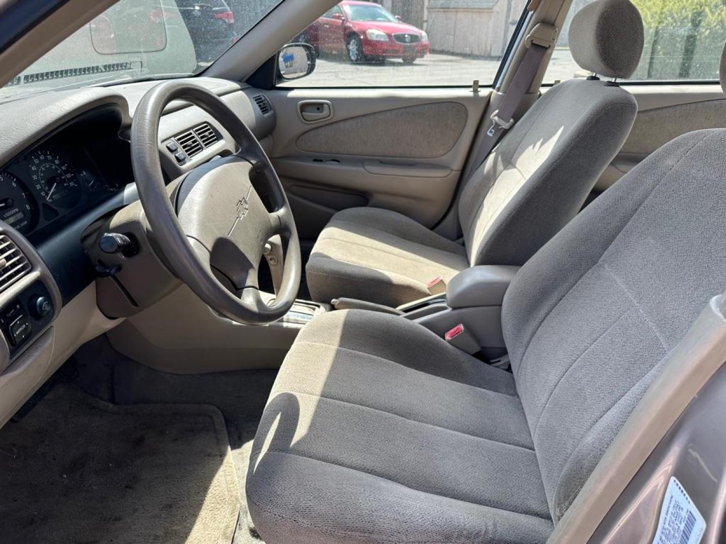 2000 TAN CHEVROLET GEO PRIZM BASE (1Y1SK5488YZ) with an 1.8L engine, Automatic transmission, located at 1708 Broadway, Rockford, IL, 61104, (815) 397-5010, 42.252522, -89.069359 - Photo#8