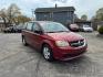 2014 RED DODGE GRAND CARAVAN SE (2C4RDGBG7ER) with an 3.6L engine, Automatic transmission, located at 1708 Broadway, Rockford, IL, 61104, (815) 397-5010, 42.252522, -89.069359 - Photo#1