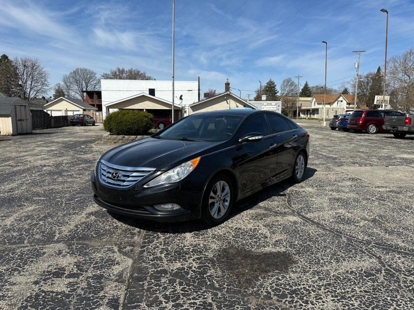 2012 BLACK HYUNDAI SONATA SE (5NPEC4AC7CH) with an 2.4L engine, Automatic transmission, located at 1708 Broadway, Rockford, IL, 61104, (815) 397-5010, 42.252522, -89.069359 - Photo#0