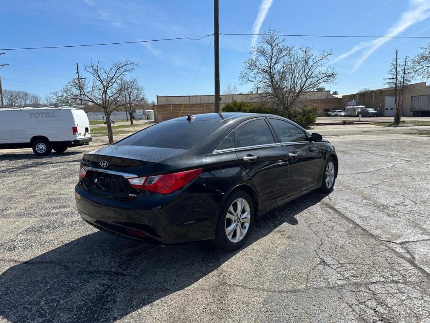 2012 BLACK HYUNDAI SONATA SE (5NPEC4AC7CH) with an 2.4L engine, Automatic transmission, located at 1708 Broadway, Rockford, IL, 61104, (815) 397-5010, 42.252522, -89.069359 - Photo#2