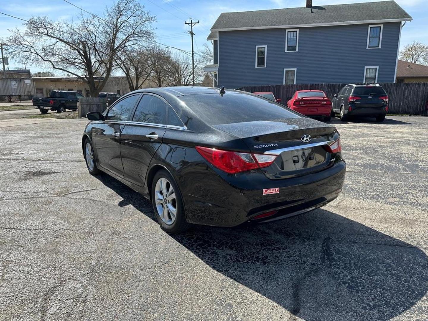 2012 BLACK HYUNDAI SONATA SE (5NPEC4AC7CH) with an 2.4L engine, Automatic transmission, located at 1708 Broadway, Rockford, IL, 61104, (815) 397-5010, 42.252522, -89.069359 - Photo#3