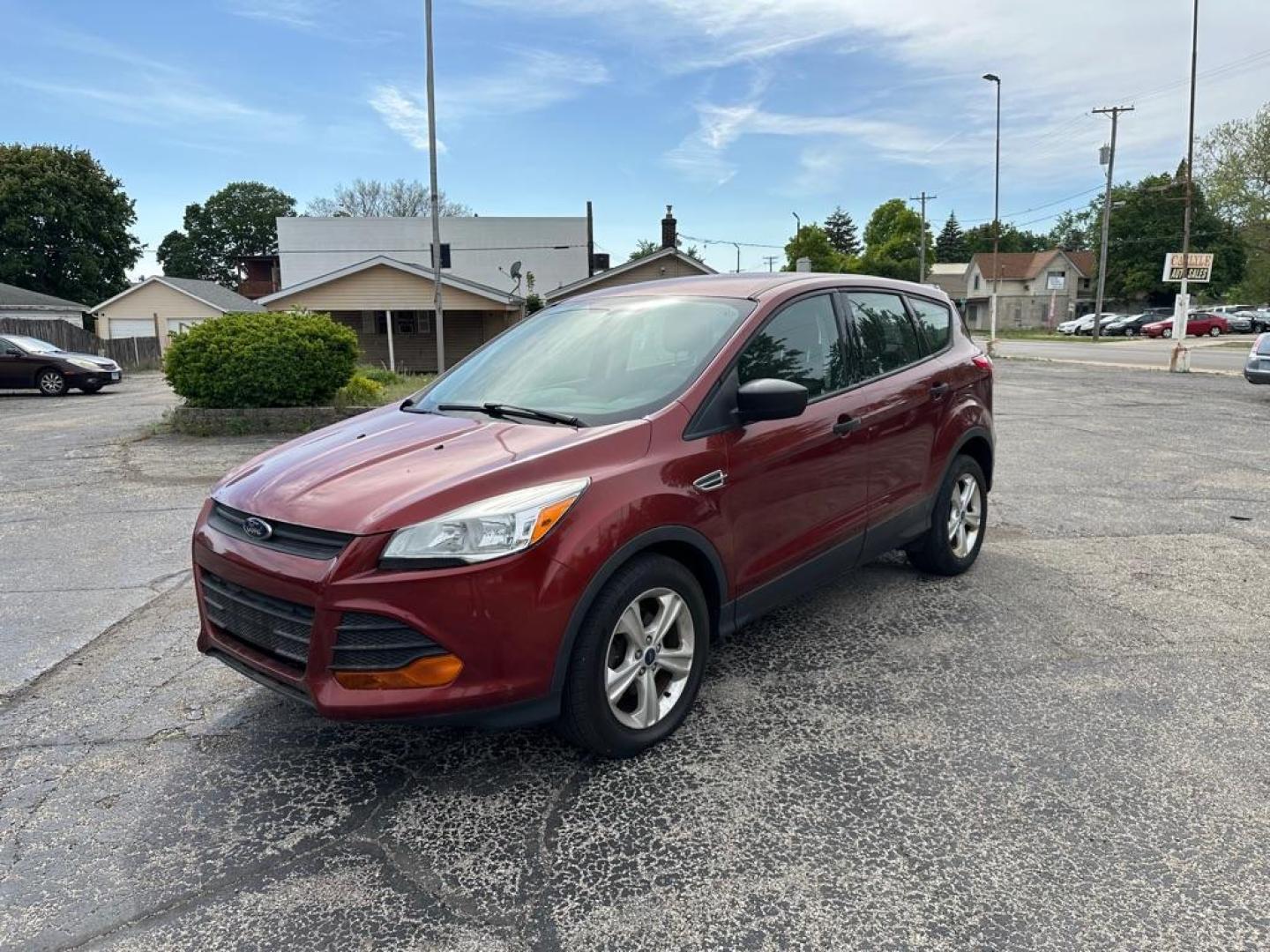 2015 ORANGE FORD ESCAPE S (1FMCU0F76FU) with an 2.5L engine, Automatic transmission, located at 1708 Broadway, Rockford, IL, 61104, (815) 397-5010, 42.252522, -89.069359 - Photo#0