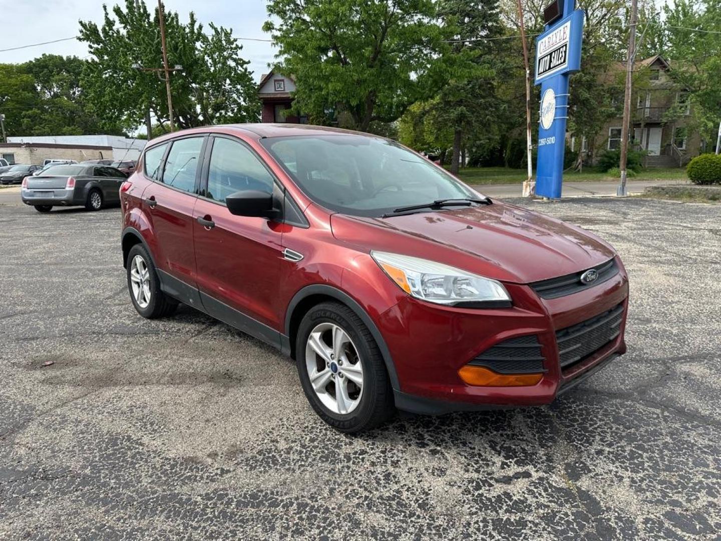 2015 ORANGE FORD ESCAPE S (1FMCU0F76FU) with an 2.5L engine, Automatic transmission, located at 1708 Broadway, Rockford, IL, 61104, (815) 397-5010, 42.252522, -89.069359 - Photo#1
