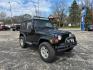 1997 BLACK JEEP WRANGLER / TJ SE (1J4FY29P8VP) with an 2.5L engine, Automatic transmission, located at 1708 Broadway, Rockford, IL, 61104, (815) 397-5010, 42.252522, -89.069359 - Photo#1