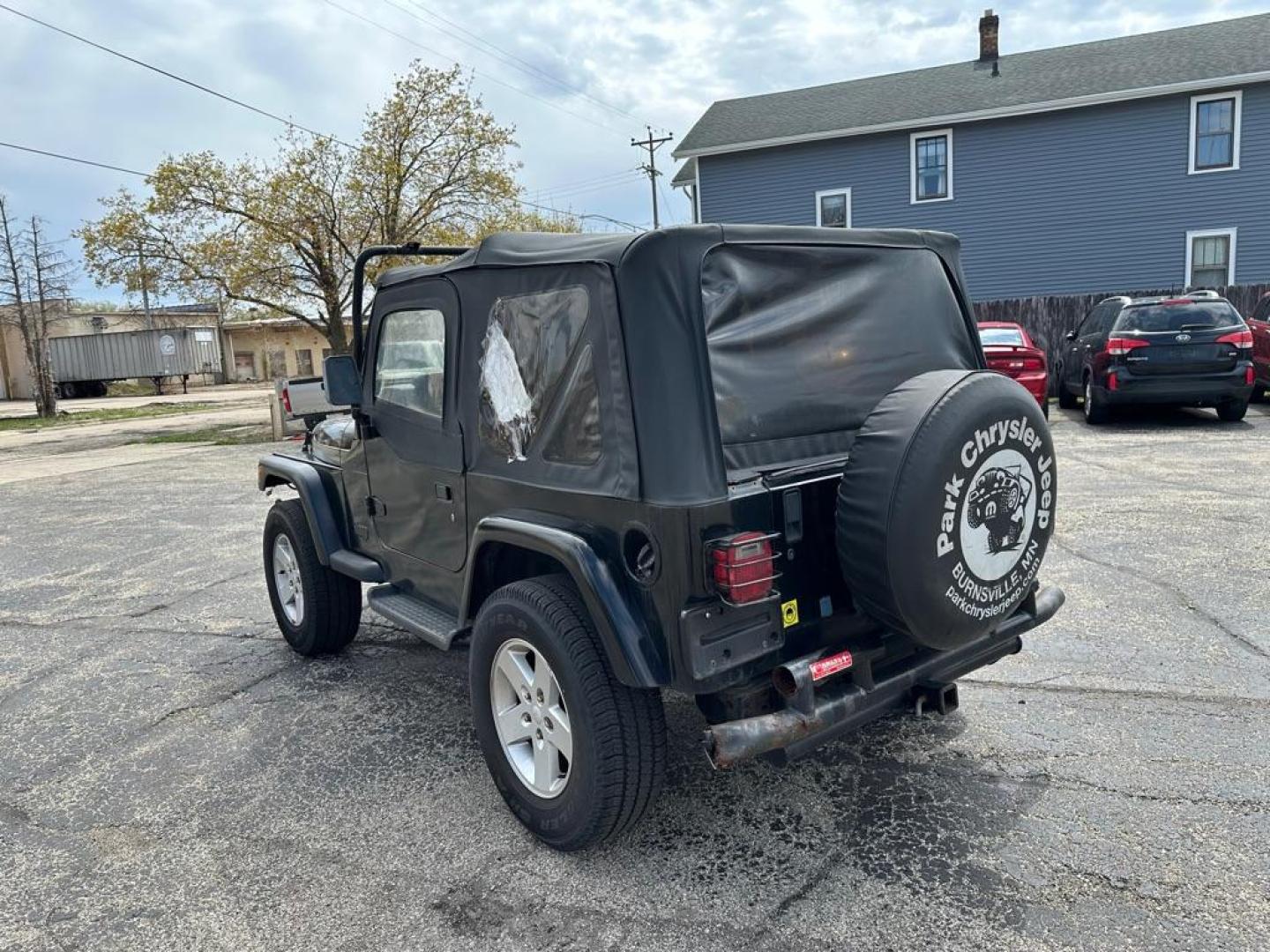 1997 BLACK JEEP WRANGLER / TJ SE (1J4FY29P8VP) with an 2.5L engine, Automatic transmission, located at 1708 Broadway, Rockford, IL, 61104, (815) 397-5010, 42.252522, -89.069359 - Photo#3