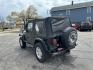 1997 BLACK JEEP WRANGLER / TJ SE (1J4FY29P8VP) with an 2.5L engine, Automatic transmission, located at 1708 Broadway, Rockford, IL, 61104, (815) 397-5010, 42.252522, -89.069359 - Photo#3