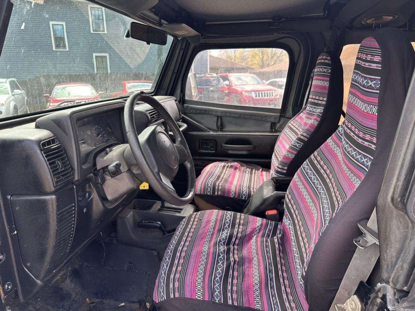 1997 BLACK JEEP WRANGLER / TJ SE (1J4FY29P8VP) with an 2.5L engine, Automatic transmission, located at 1708 Broadway, Rockford, IL, 61104, (815) 397-5010, 42.252522, -89.069359 - Photo#4