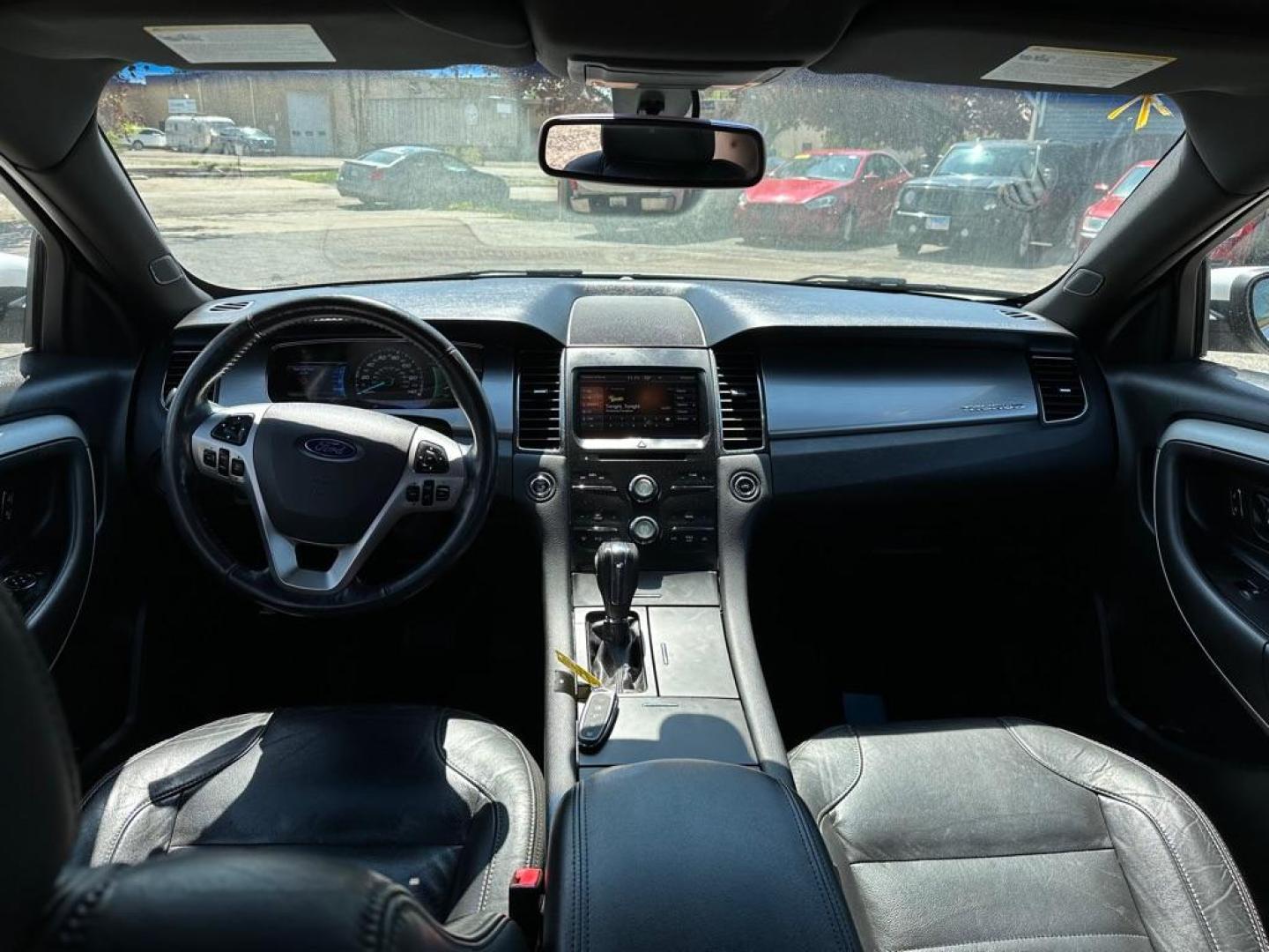2015 WHITE FORD TAURUS SEL (1FAHP2E83FG) with an 3.5L engine, Automatic transmission, located at 1708 Broadway, Rockford, IL, 61104, (815) 397-5010, 42.252522, -89.069359 - Photo#5
