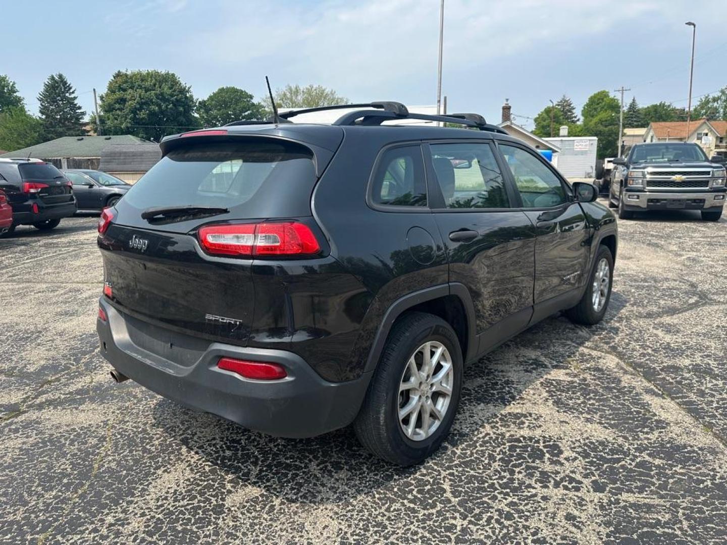 2016 BLACK JEEP CHEROKEE SPORT (1C4PJMAB5GW) with an 2.4L engine, Automatic transmission, located at 1708 Broadway, Rockford, IL, 61104, (815) 397-5010, 42.252522, -89.069359 - Photo#2