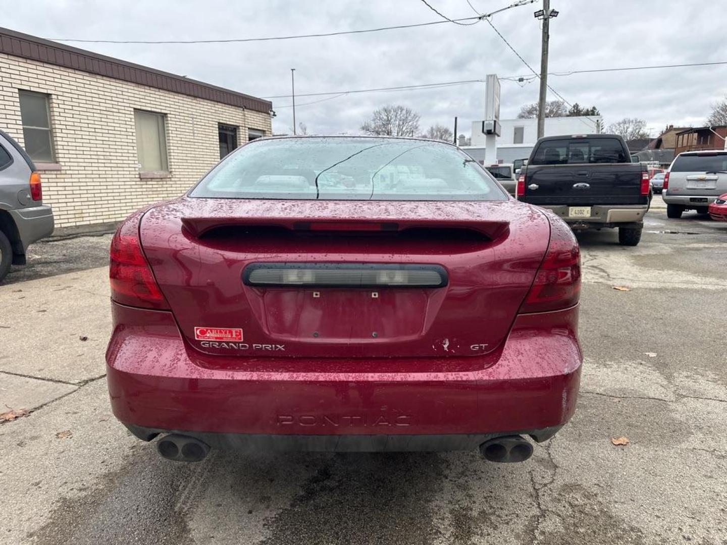 2005 MAROON PONTIAC GRAND PRIX GT (2G2WS522251) with an 3.8L engine, Automatic transmission, located at 1708 Broadway, Rockford, IL, 61104, (815) 397-5010, 42.252522, -89.069359 - Photo#2