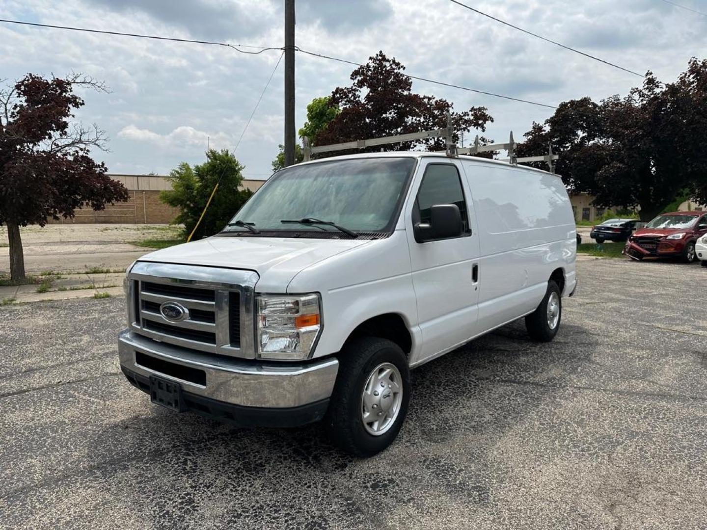 2012 WHITE FORD ECONOLINE E150 VAN (1FTNE1EW1CD) with an 4.6L engine, Automatic transmission, located at 1708 Broadway, Rockford, IL, 61104, (815) 397-5010, 42.252522, -89.069359 - Photo#0