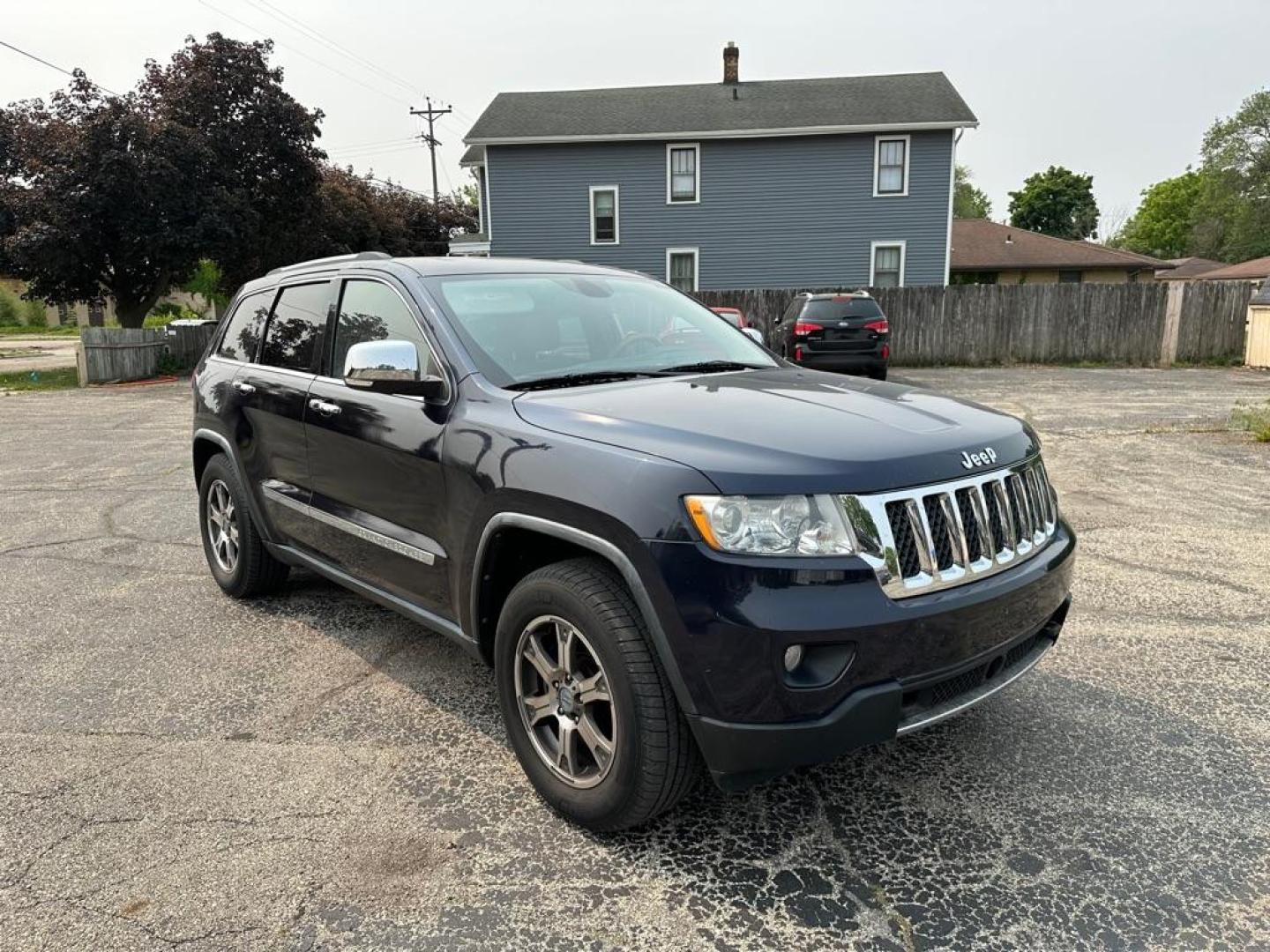 2011 BLUE JEEP GRAND CHEROKEE OVERLAND (1J4RR6GT9BC) with an 5.7L engine, Automatic transmission, located at 1708 Broadway, Rockford, IL, 61104, (815) 397-5010, 42.252522, -89.069359 - Photo#1
