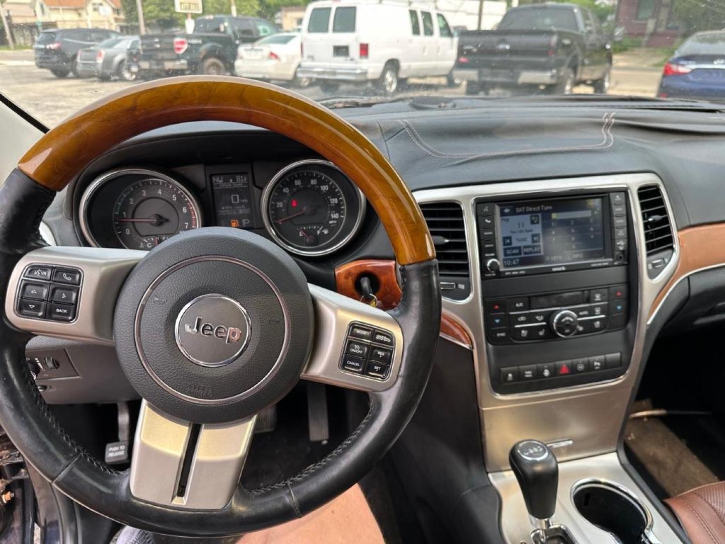 2011 BLUE JEEP GRAND CHEROKEE OVERLAND (1J4RR6GT9BC) with an 5.7L engine, Automatic transmission, located at 1708 Broadway, Rockford, IL, 61104, (815) 397-5010, 42.252522, -89.069359 - Photo#9