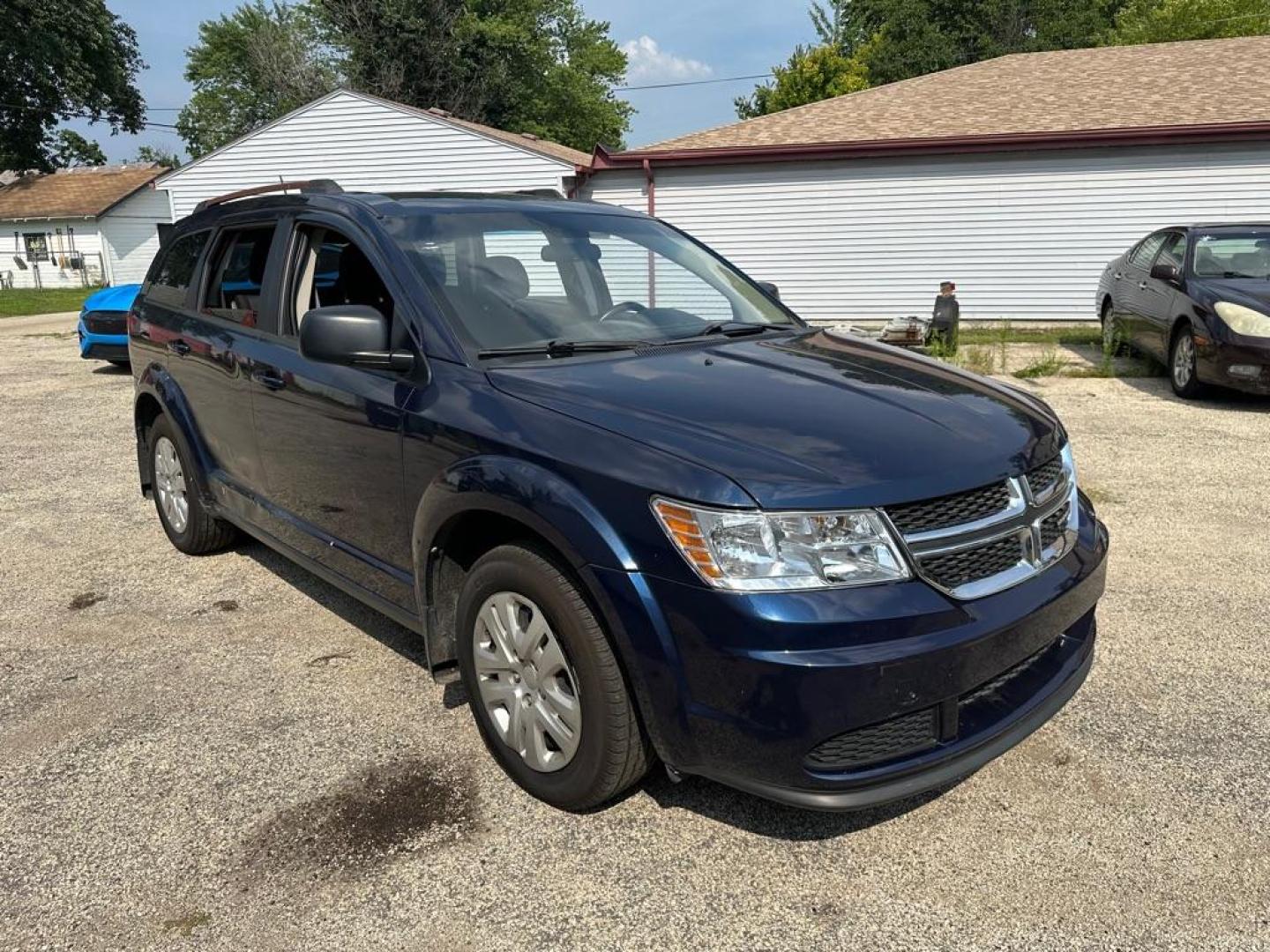 2017 BLUE DODGE JOURNEY SE (3C4PDCAB0HT) with an 2.4L engine, Automatic transmission, located at 1708 Broadway, Rockford, IL, 61104, (815) 397-5010, 42.252522, -89.069359 - Photo#2