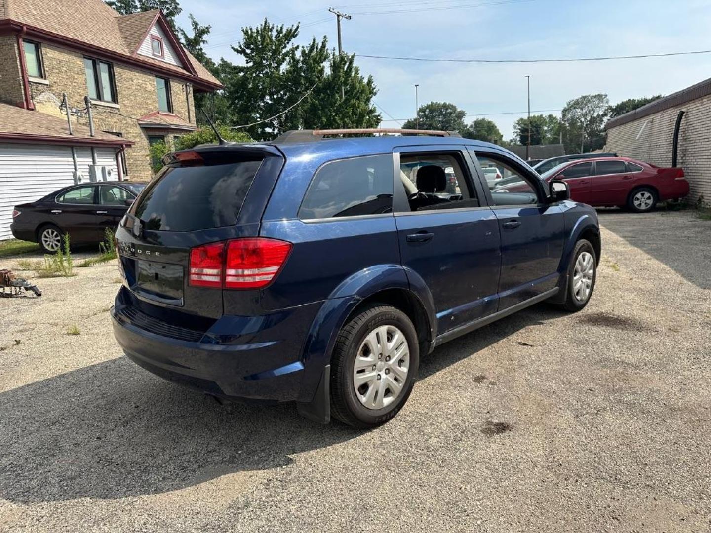 2017 BLUE DODGE JOURNEY SE (3C4PDCAB0HT) with an 2.4L engine, Automatic transmission, located at 1708 Broadway, Rockford, IL, 61104, (815) 397-5010, 42.252522, -89.069359 - Photo#4