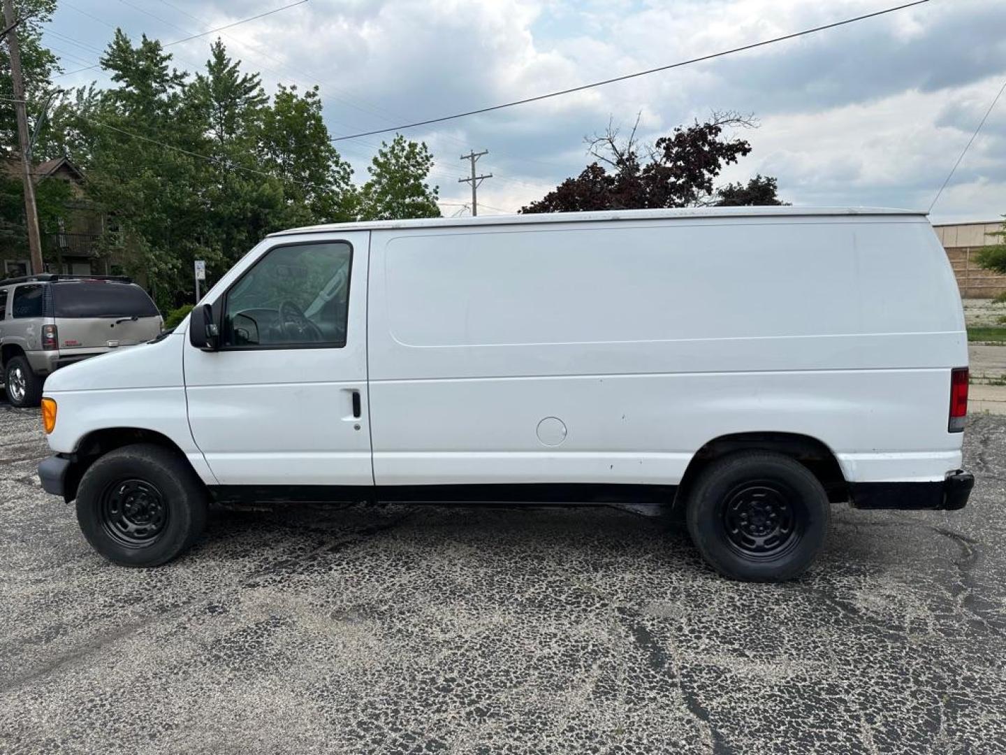 2006 WHITE FORD ECONOLINE E150 VAN (1FTRE14W86D) with an 4.6L engine, Automatic transmission, located at 1708 Broadway, Rockford, IL, 61104, (815) 397-5010, 42.252522, -89.069359 - Photo#7