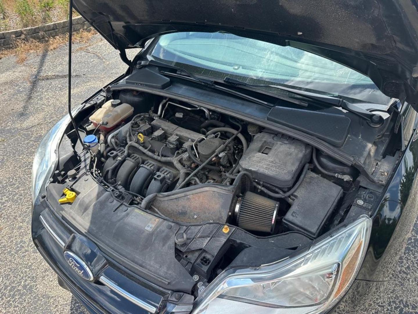 2012 BLACK FORD FOCUS SE (1FAHP3F2XCL) with an 2.0L engine, Automatic transmission, located at 1708 Broadway, Rockford, IL, 61104, (815) 397-5010, 42.252522, -89.069359 - Photo#16