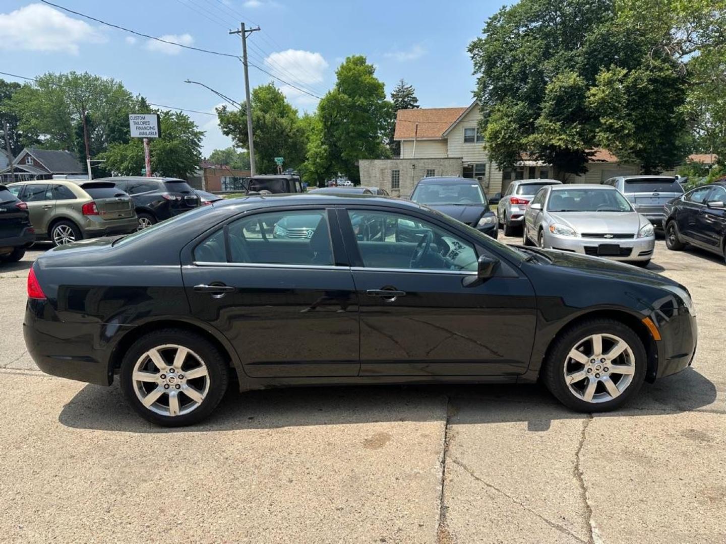 2011 BLACK MERCURY MILAN PREMIER (3MEHM0JG4BR) with an 3.0L engine, Automatic transmission, located at 1708 Broadway, Rockford, IL, 61104, (815) 397-5010, 42.252522, -89.069359 - Photo#3