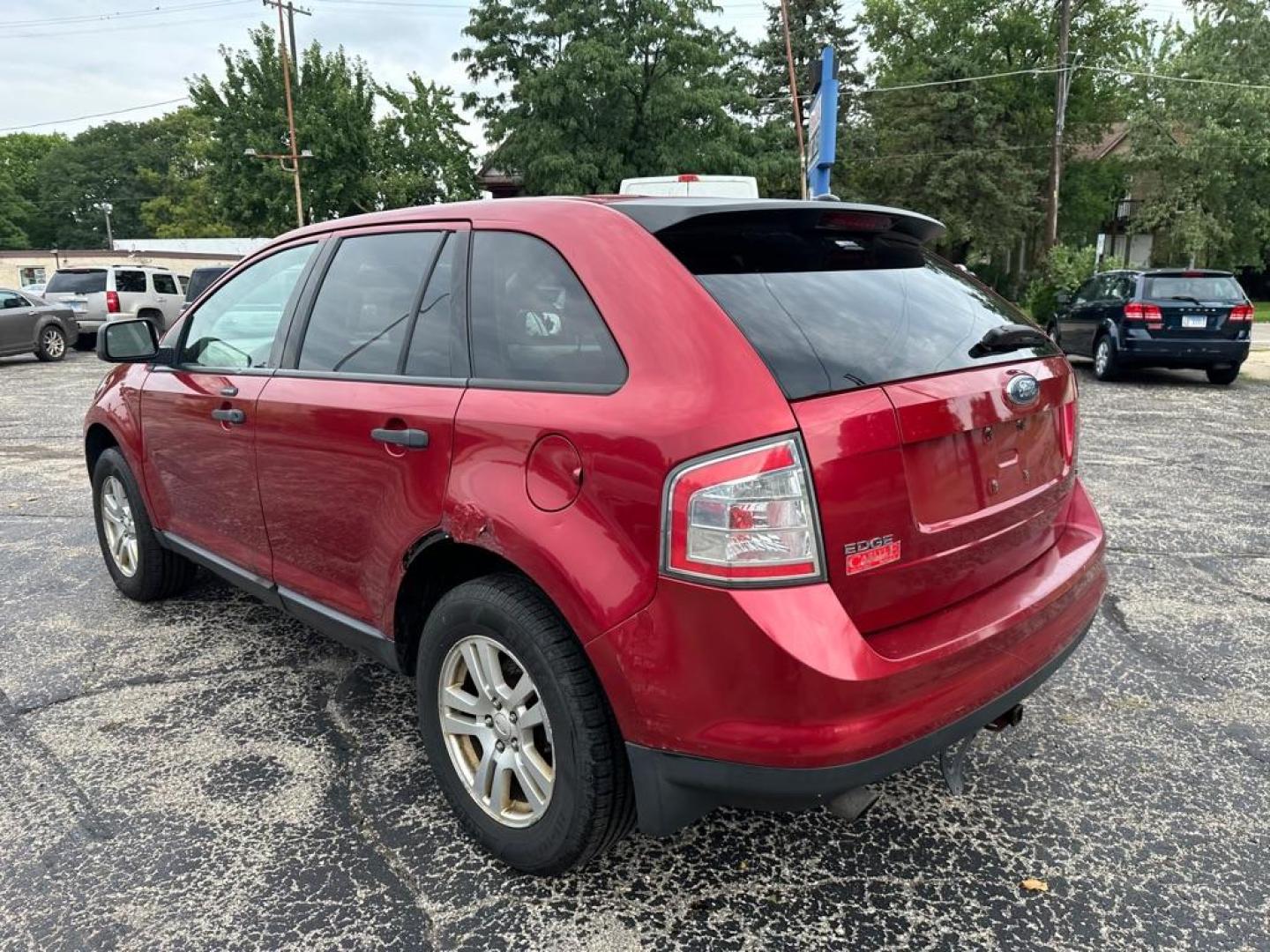 2007 RED FORD EDGE SE (2FMDK46C17B) with an 3.5L engine, Automatic transmission, located at 1708 Broadway, Rockford, IL, 61104, (815) 397-5010, 42.252522, -89.069359 - Photo#6