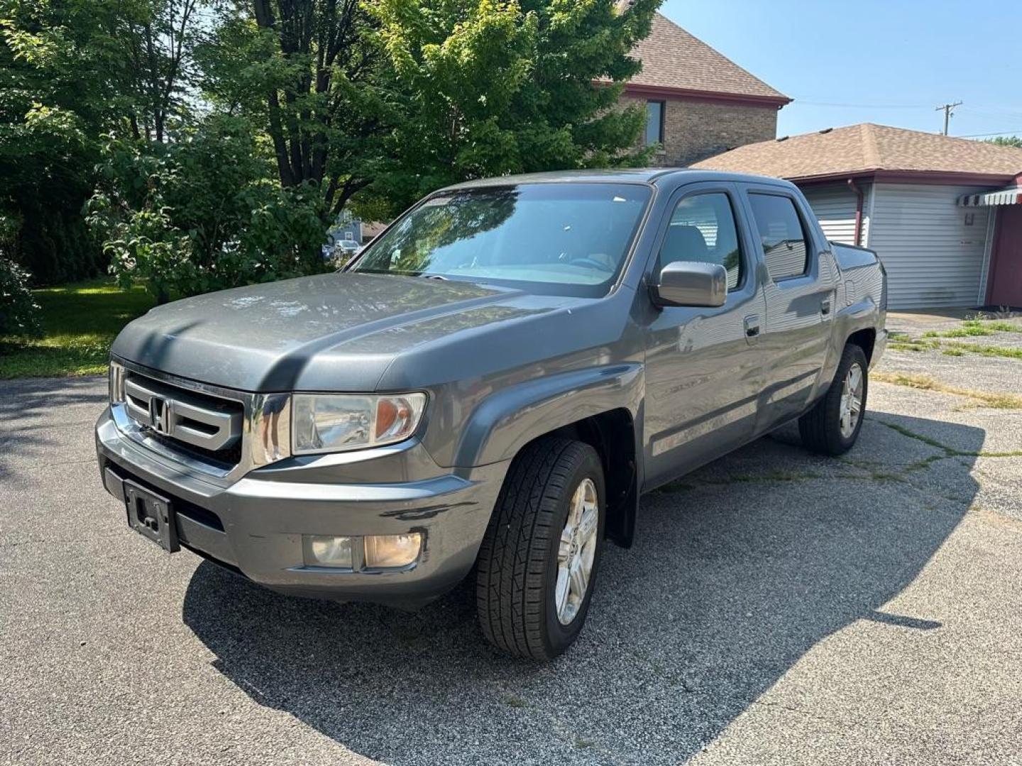 2011 GRAY HONDA RIDGELINE RTL (5FPYK1F53BB) with an 3.5L engine, Automatic transmission, located at 1708 Broadway, Rockford, IL, 61104, (815) 397-5010, 42.252522, -89.069359 - Photo#0