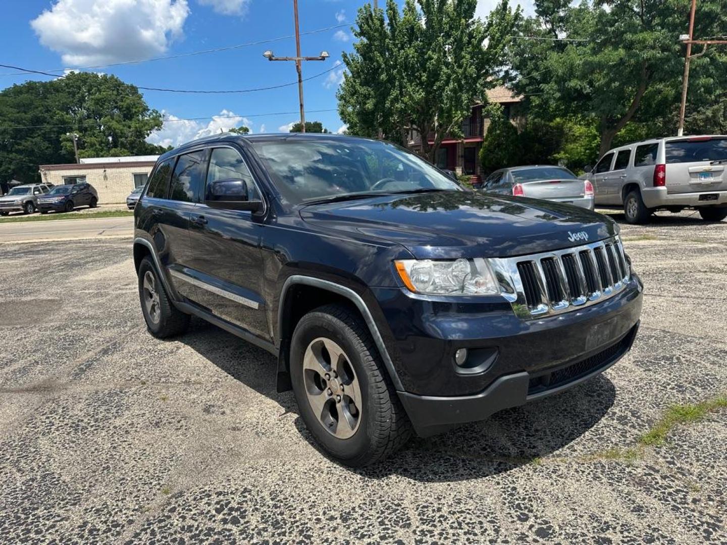 2011 BLUE JEEP GRAND CHEROKEE LAREDO (1J4RR4GGXBC) with an 3.6L engine, Automatic transmission, located at 1708 Broadway, Rockford, IL, 61104, (815) 397-5010, 42.252522, -89.069359 - Photo#1